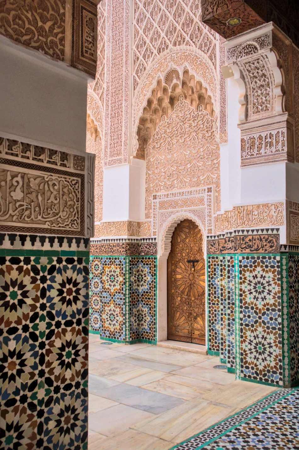 Carved stucco and zellij tilework in a Moroccan madrasa